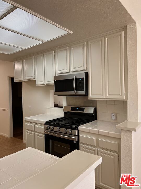 Residential for sale at 11910 Weddington Street 306, Valley Village CA featuring 2 beds and 3 baths