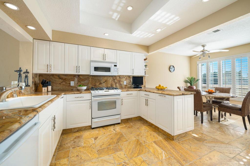 Residential for sale at 684 Vista Lago Circle N, Palm Desert CA featuring 3 beds and 3 baths