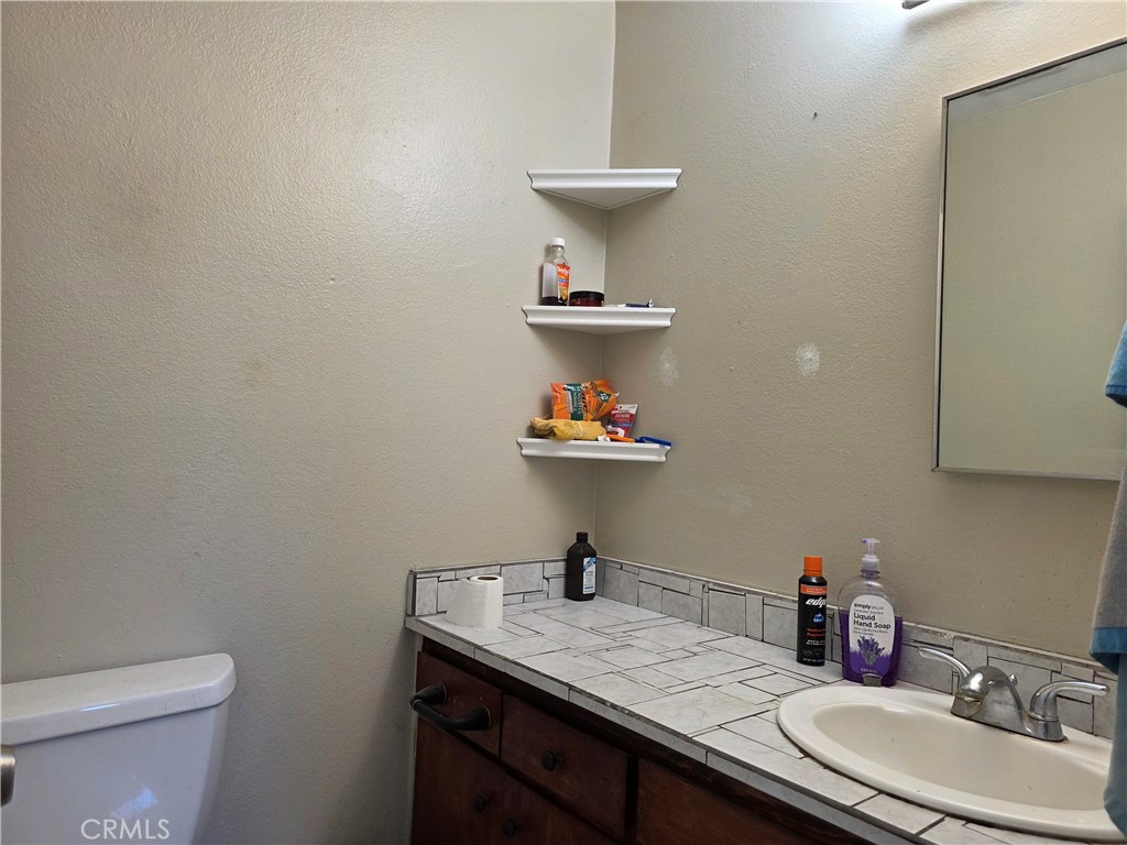 Residential for sale at 11219 Hood, Stanton CA featuring 3 beds and 2 baths