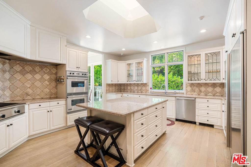 Residential for sale at 915 Hartford Way, Beverly Hills CA featuring 5 beds and 6 baths