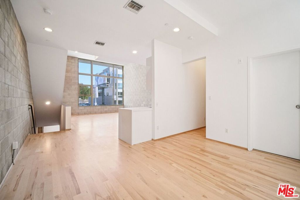 Residential for sale at 717 N Highland Avenue 13, Los Angeles, CA featuring 2 beds and 2 baths