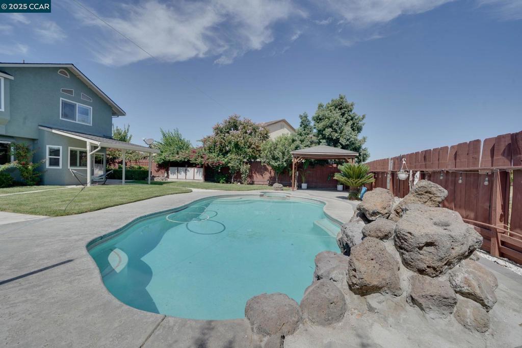 Residential for sale at 1210 Snow Ridge Ct, Modesto CA featuring 4 beds and 3 baths