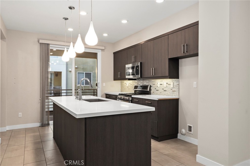 Residential for sale at 479 Marc Place C, Azusa CA featuring 3 beds and 4 baths