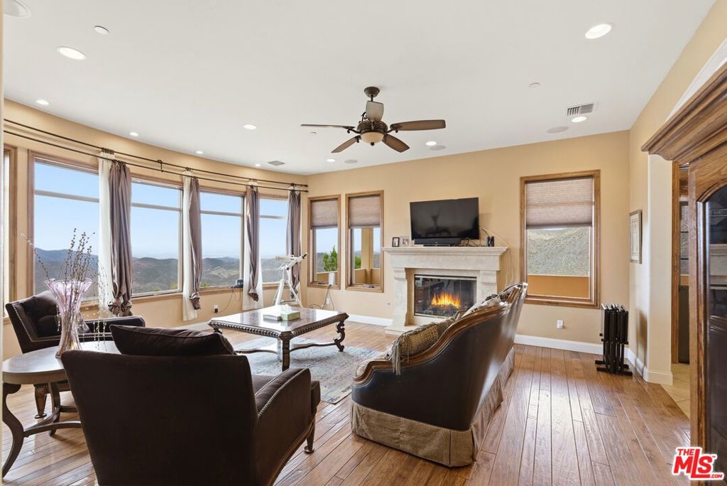 Residential for sale at 10825 Pacific View Drive, Malibu CA featuring 5 beds and 5 baths