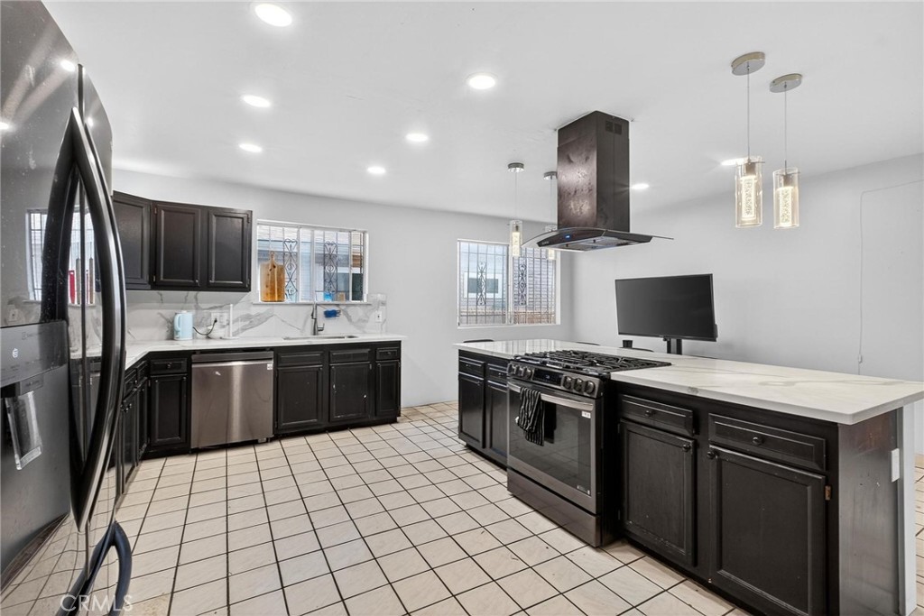 Residential for sale at 1139 E 82nd, Los Angeles CA featuring 4 beds and 3 baths