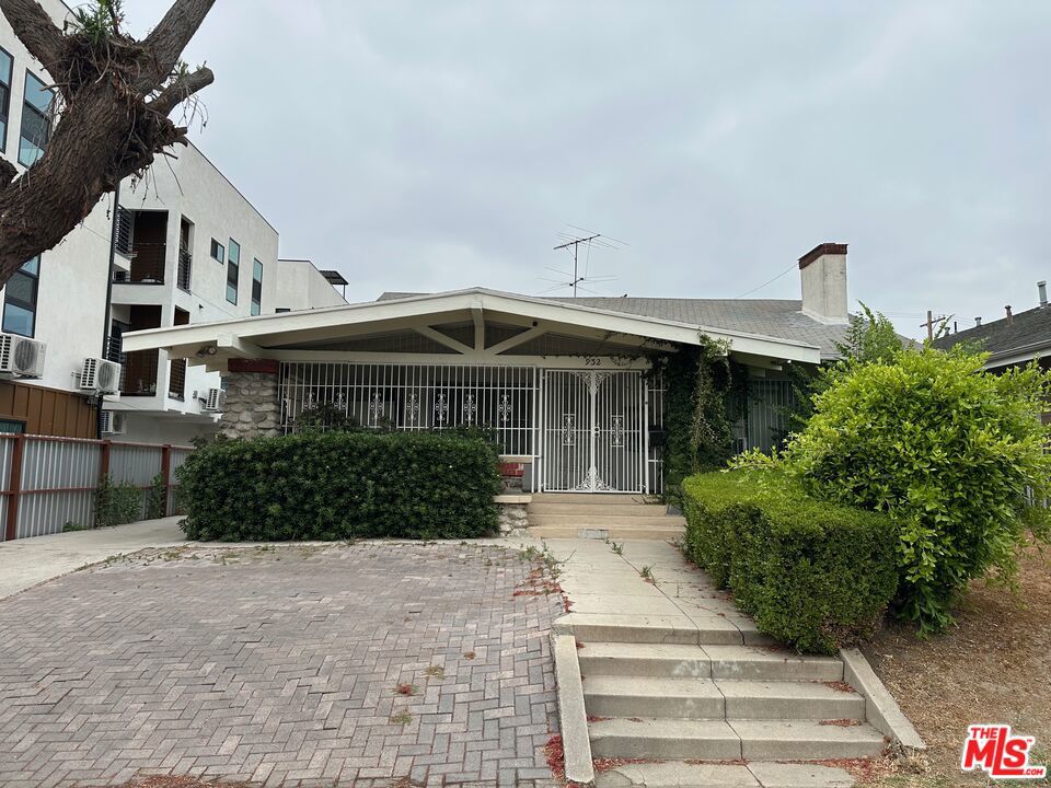 Residential for sale at 932 S Harvard Boulevard, Los Angeles CA featuring 3 beds and 2 baths