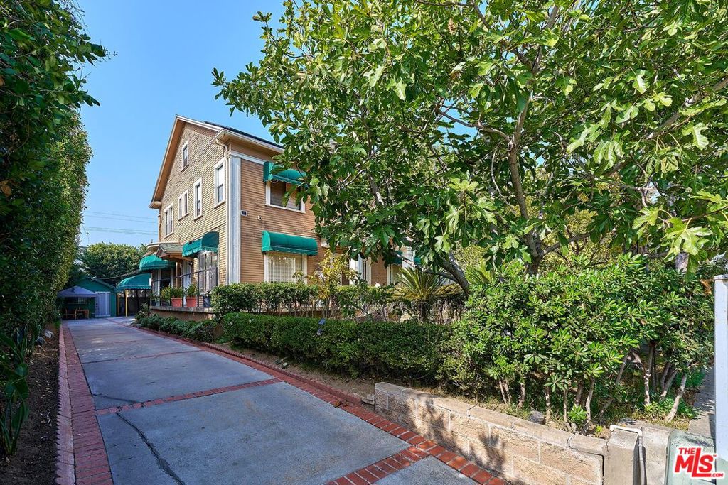 Residential for sale at 1023 S Wilton Place, Los Angeles CA featuring 7 beds and 7 baths