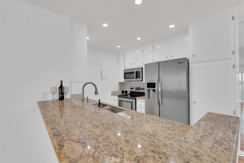 Residential for sale at 2521 W Sunflower H2, Santa Ana CA featuring 2 beds and 2 baths
