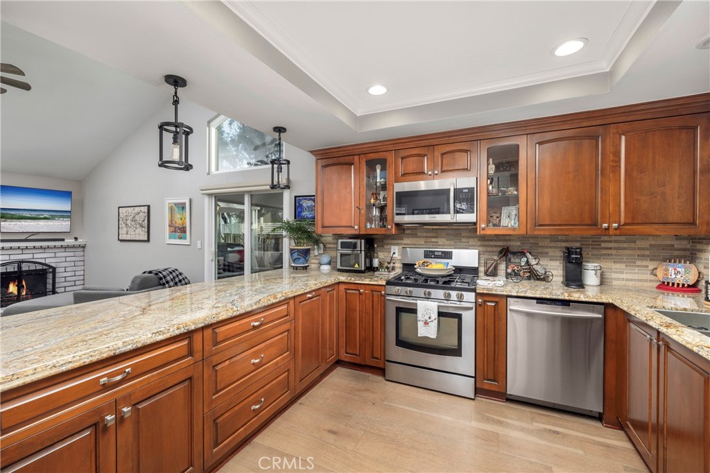 Residential for sale at 18446 Gina Lane, Huntington Beach CA featuring 2 beds and 2 baths