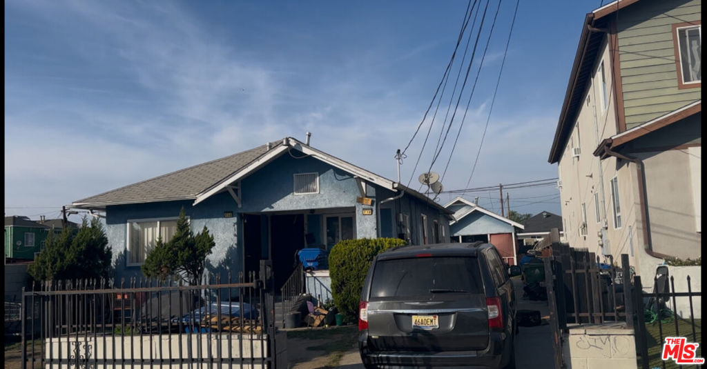 Residential Income for sale at 719 W 55th Street, Los Angeles CA featuring 3 beds and 3 baths
