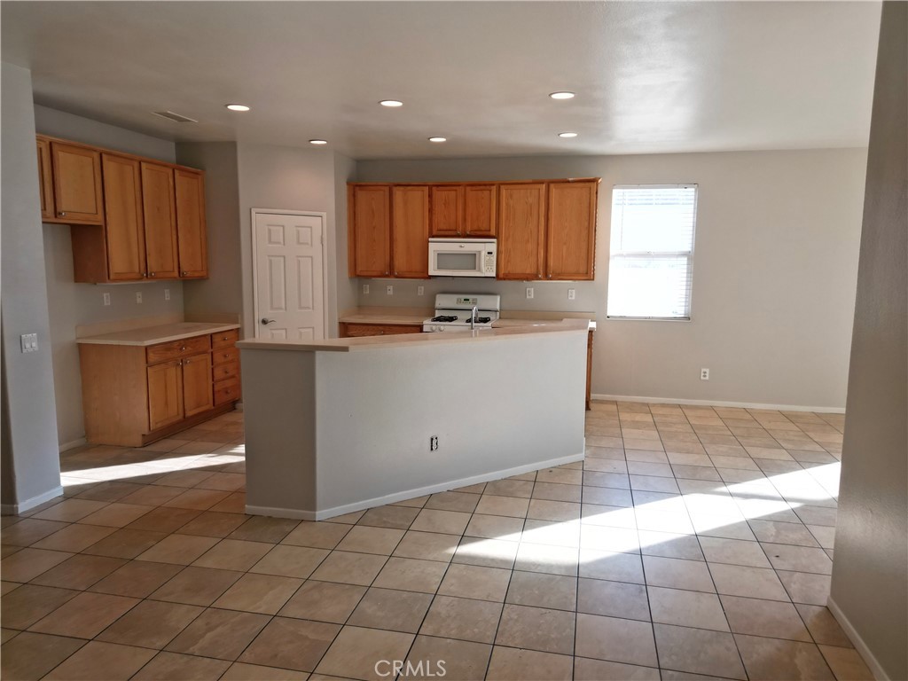 Residential for sale at 11807 Desert Glen, Adelanto CA featuring 4 beds and 2 baths