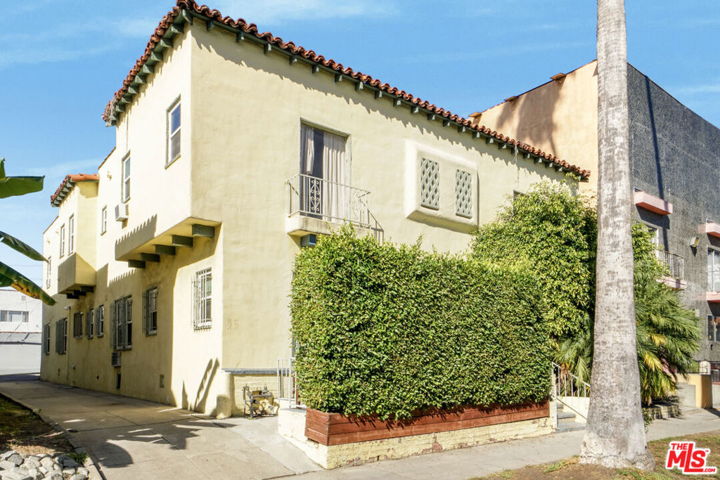 Residential Income for sale at 325 N Stanley Avenue, Los Angeles CA featuring 8 beds and 4 baths