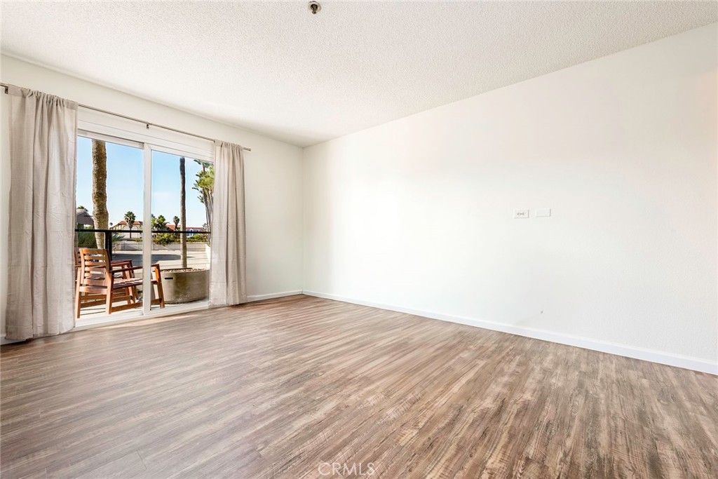 Residential for sale at 16255 Pacific Circle 106, Huntington Beach CA featuring 3 beds and 4 baths