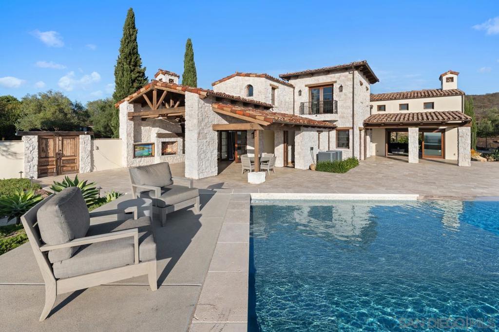 Residential for sale at 8069 Entrada De Luz E, San Diego CA featuring 4 beds and 6 baths