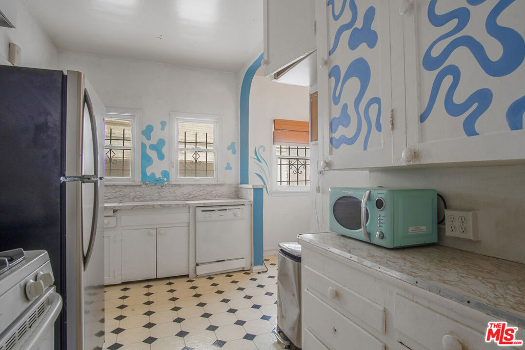 Residential Income for sale at 712 S Stanley Avenue, Los Angeles CA featuring 10 beds and 8 baths