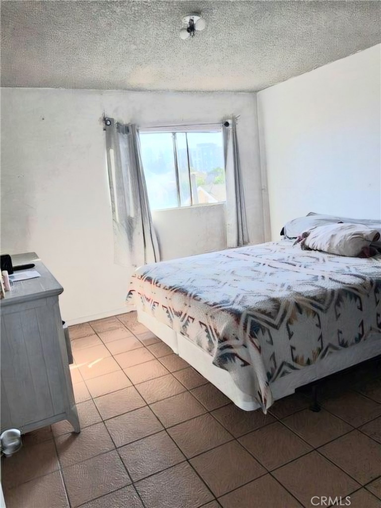 Residential Income for sale at 1715 E 70th, Los Angeles CA