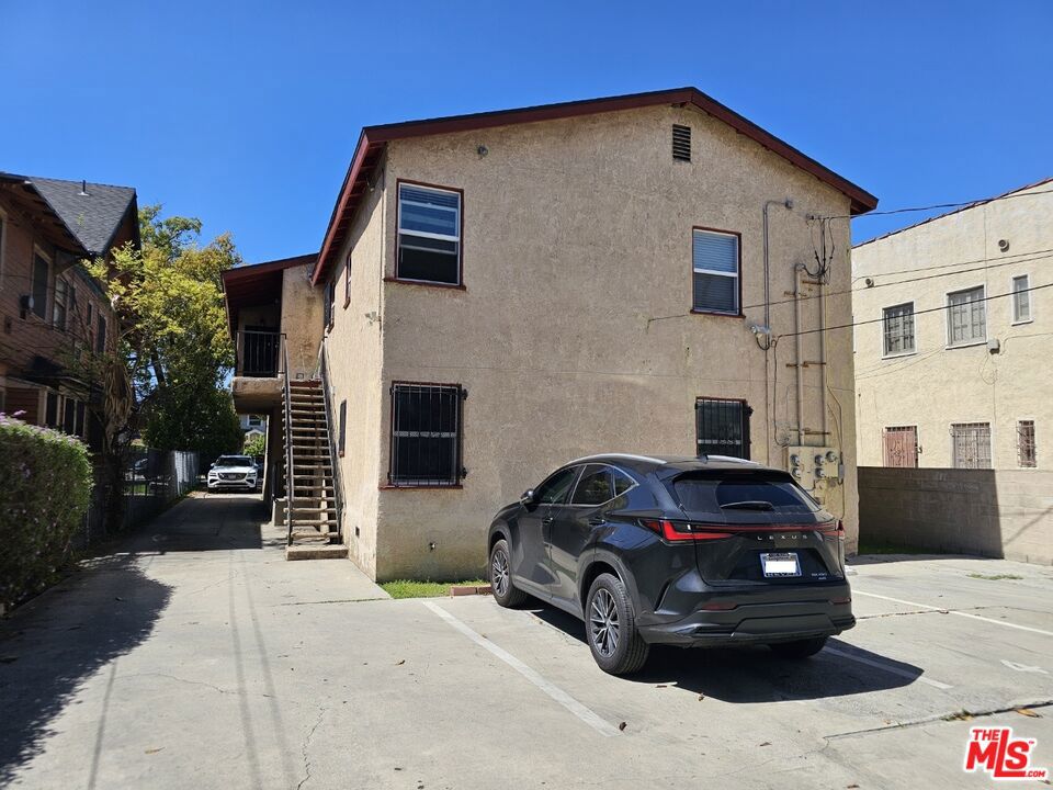 Residential Income for sale at 1824 S Wilton Place, Los Angeles CA featuring 8 beds and 4 baths