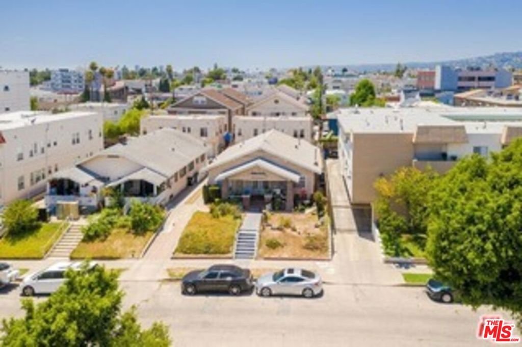 Residential Income for sale at 423 N Serrano Avenue, Los Angeles CA featuring 3 beds and 1 bath