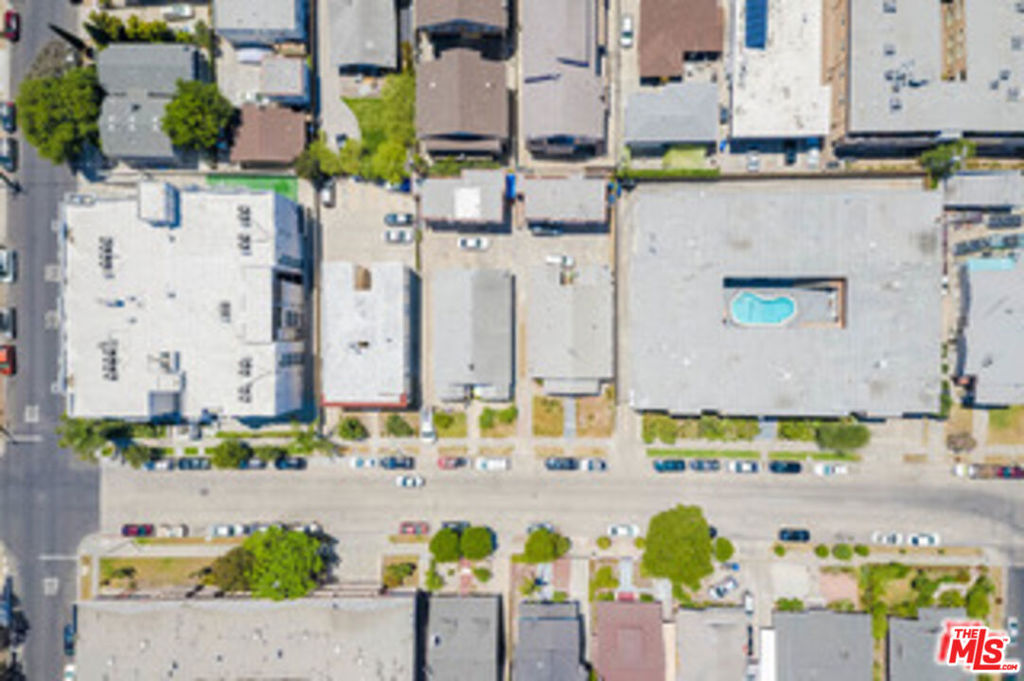Residential Income for sale at 417 N Serrano Avenue 3, Los Angeles CA featuring 4 beds and 3 baths