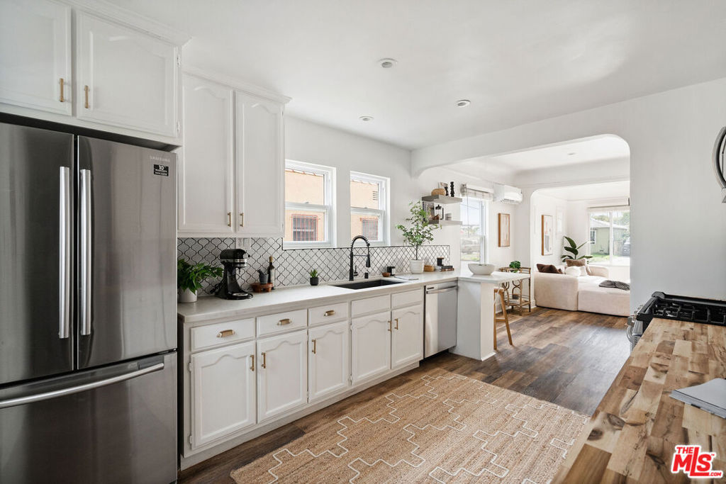 Residential for sale at 607 W 111th Place, Los Angeles CA featuring 2 beds and 1 bath