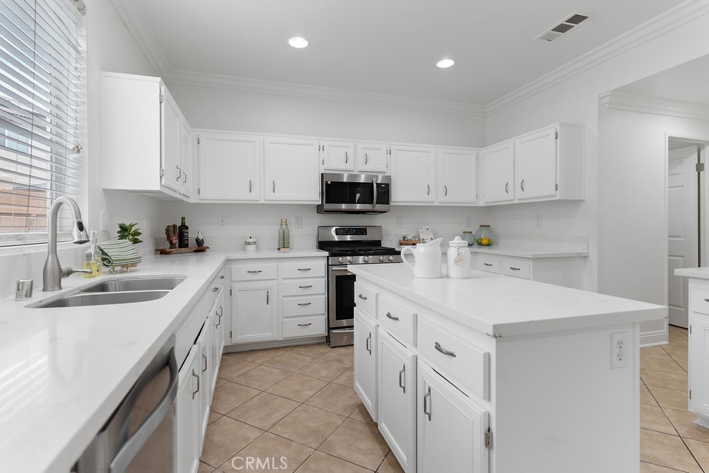 Residential for sale at 15611 Kadota, Victorville CA featuring 4 beds and 3 baths