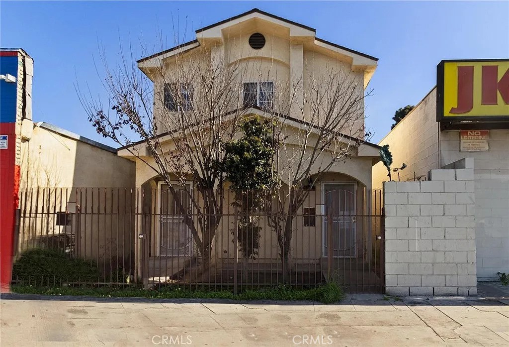 Residential for sale at 9714 S Main Street, Los Angeles CA featuring 6 beds and 4 baths
