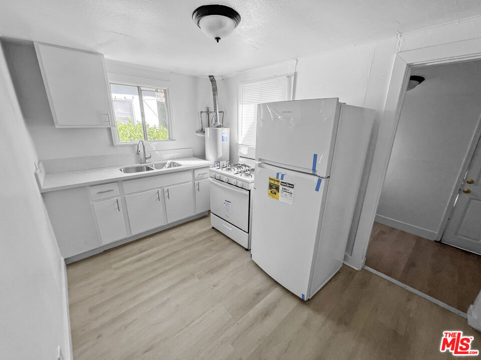 Residential Income for sale at 920 W 3rd Street, Pomona CA featuring 5 beds and 4 baths