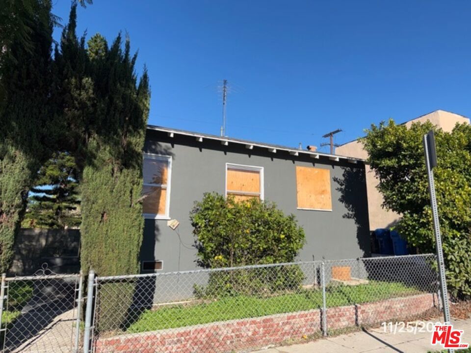 Residential Income for sale at 1740 S Rimpau Boulevard, Los Angeles CA featuring 6 beds and 3 baths