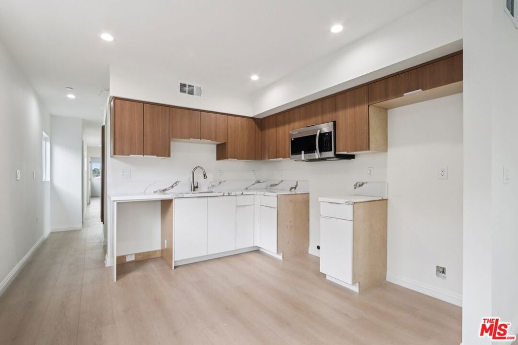 Residential Income for sale at 1675 E 111th Street, Los Angeles CA featuring 8 beds and 6 baths