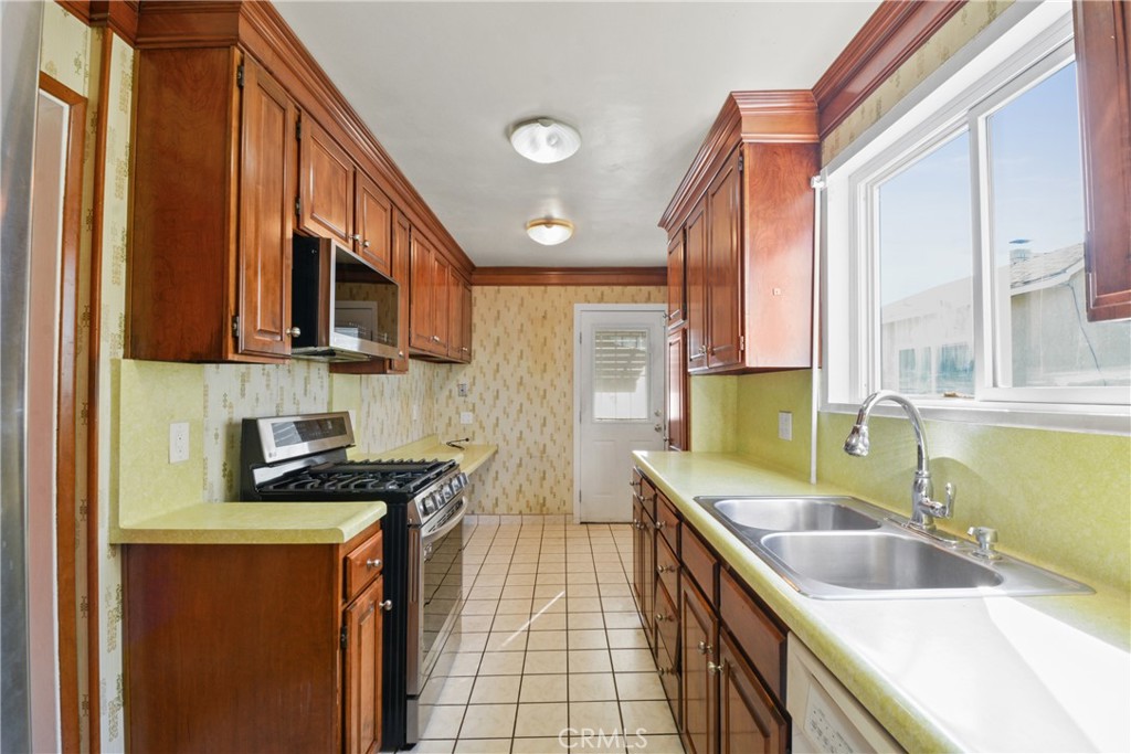Residential for sale at 2202 W 153rd Street, Compton CA featuring 4 beds and 3 baths