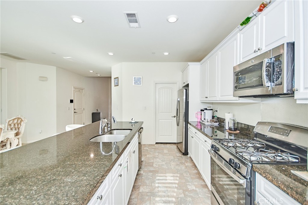 Residential for sale at 15607 Allspice Lane, Fontana CA featuring 4 beds and 3 baths