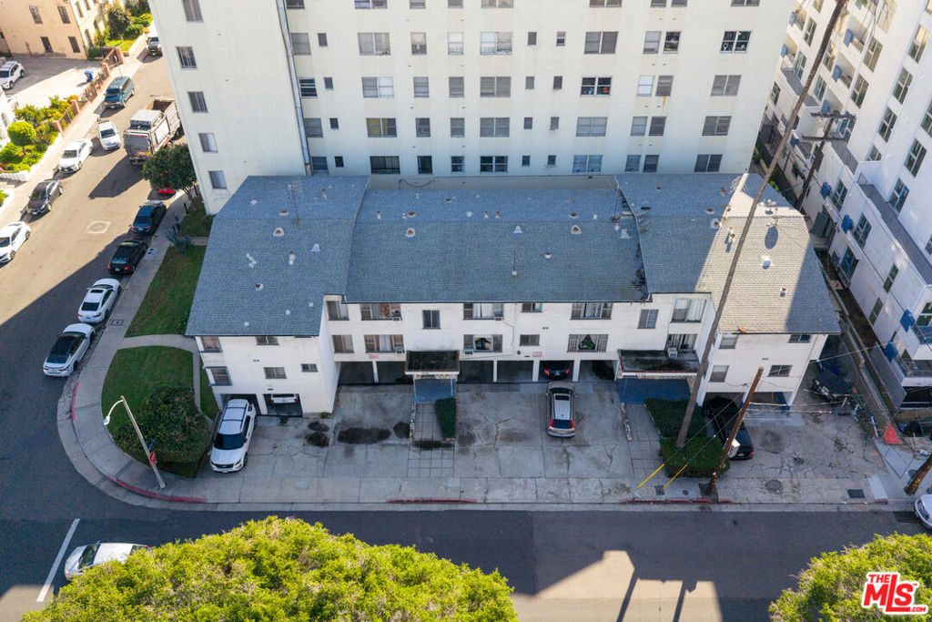 Residential Income for sale at 505 S Serrano Avenue, Los Angeles CA featuring 10 beds and 14 baths