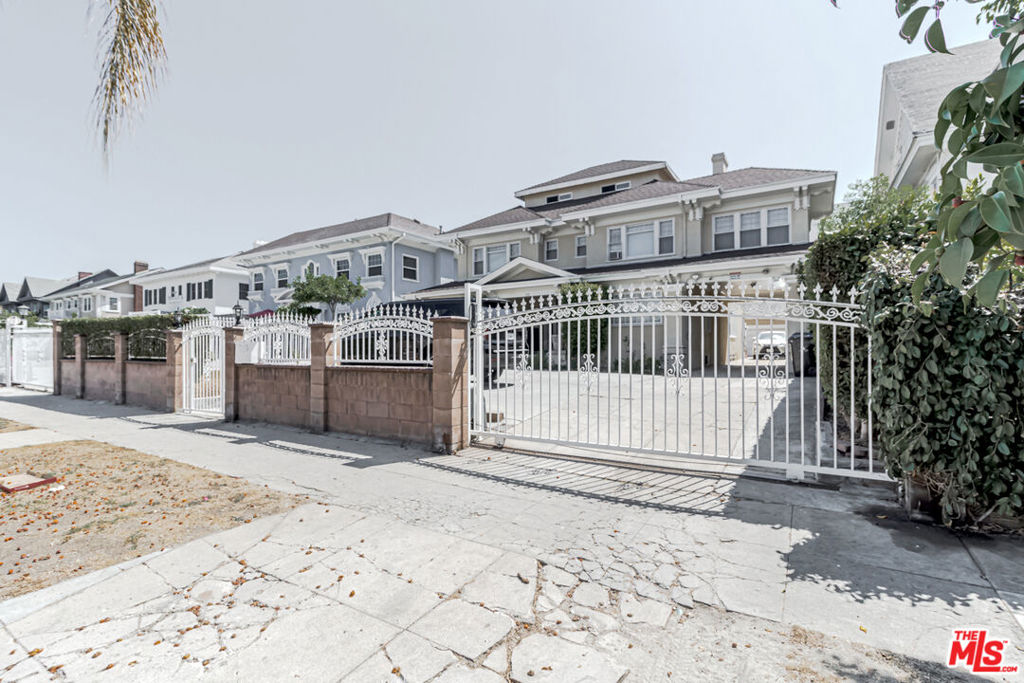 Residential for sale at 450 S Serrano Avenue, Los Angeles CA featuring 4 beds and 5 baths