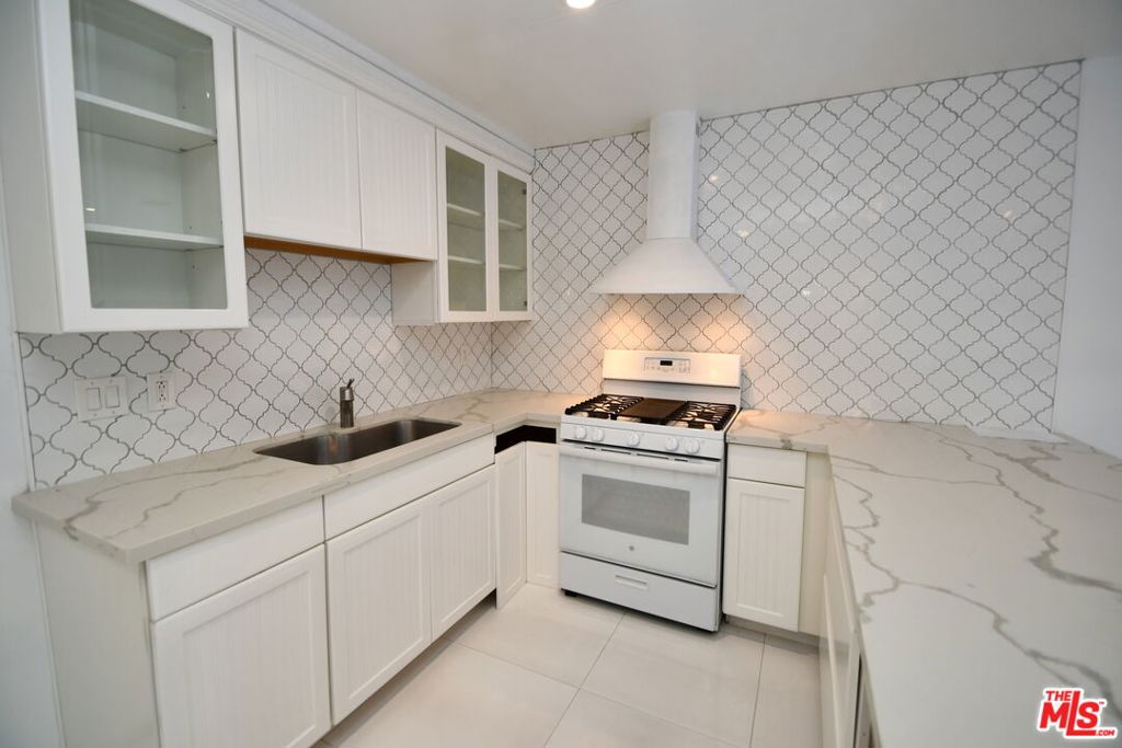 Residential for sale at 14730 S Normandie Avenue 3, Gardena CA featuring 2 beds and 2 baths