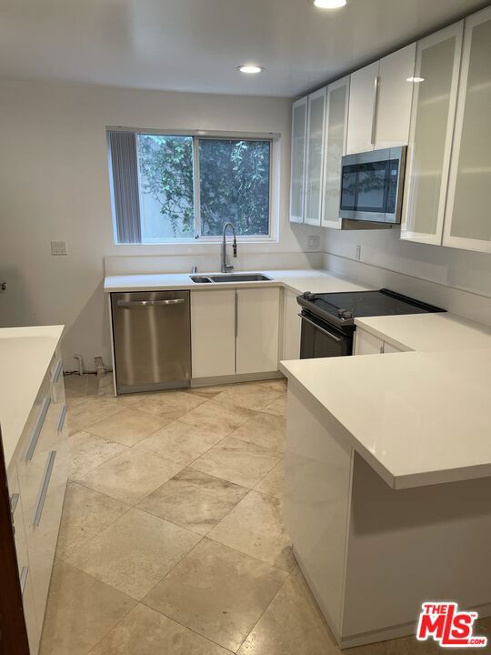 Residential Lease for rent at 9297 Burton Way A, Beverly Hills CA featuring 3 beds and 2 baths