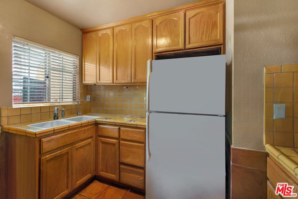 Residential Income for sale at 4713 Clinton Street, Los Angeles CA featuring 2 beds and 2 baths