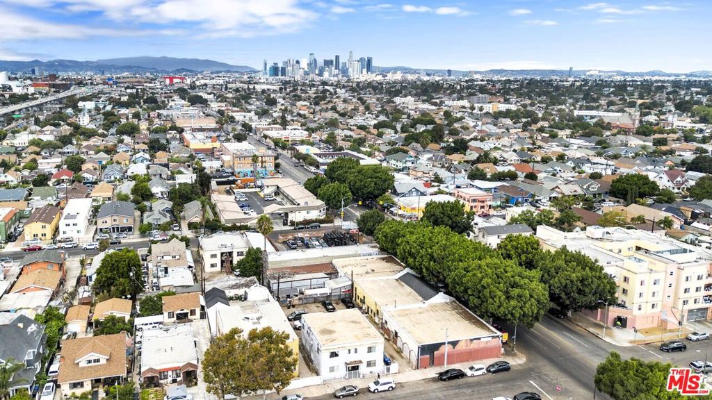 Residential Income for sale at 309 W 50th Street, Los Angeles CA featuring 4 beds and 4 baths