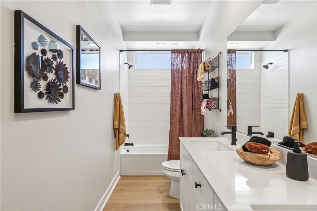 Residential for sale at 11714 Arkansas Street A, Artesia CA featuring 3 beds and 3 baths