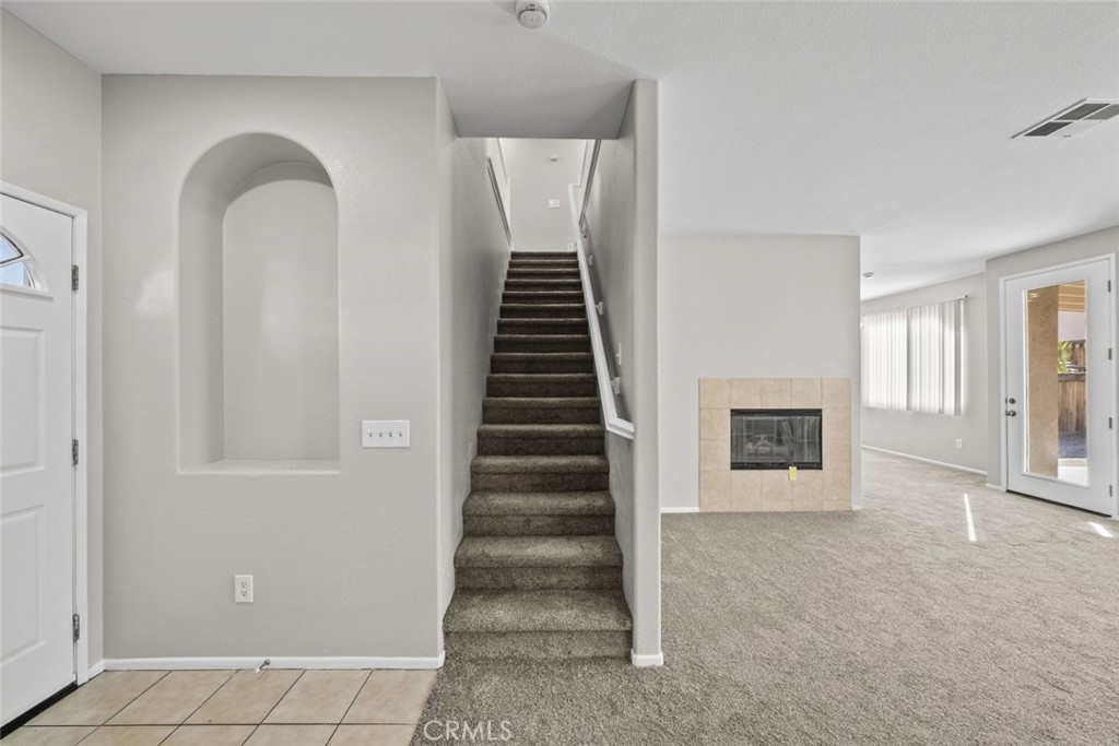 Residential for sale at 14323 Moon Valley Street, Victorville CA featuring 4 beds and 3 baths