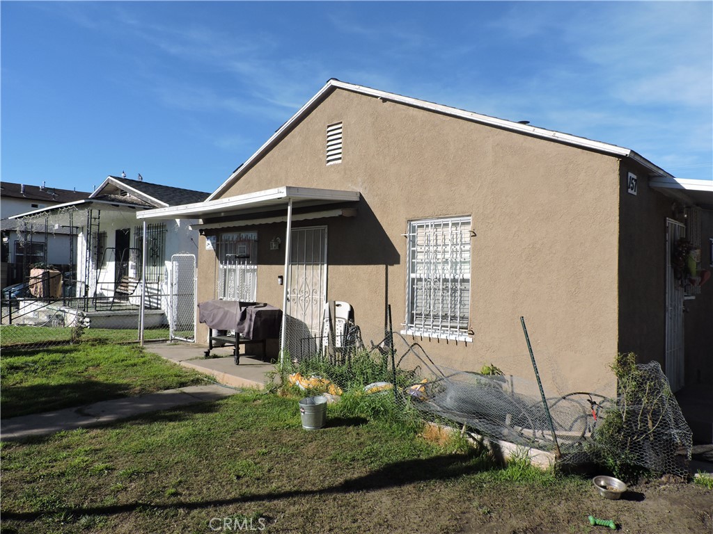 Residential Income for sale at 157 E 104th Street, Los Angeles CA
