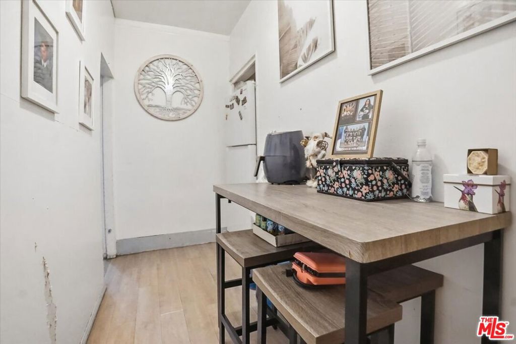 Residential Income for sale at 214 N Alma Avenue, Los Angeles CA featuring 6 beds and 3 baths