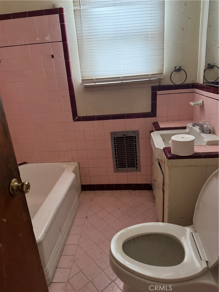 Residential Income for sale at 11022 Benwell, Lynwood CA