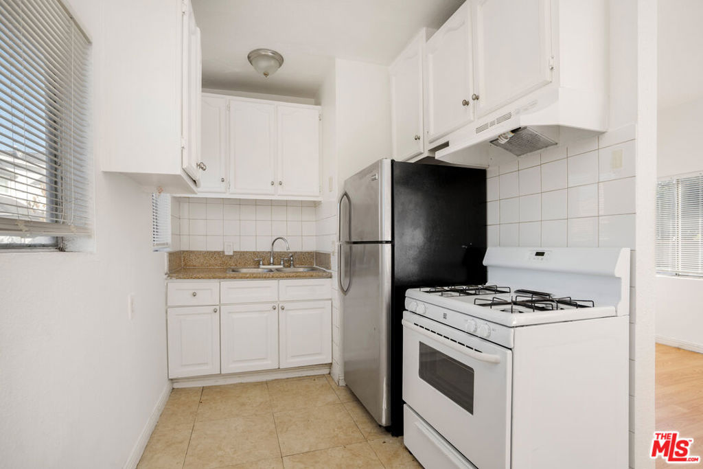 Residential Income for sale at 2440 Wabash Avenue, Los Angeles CA featuring 5 beds and 5 baths