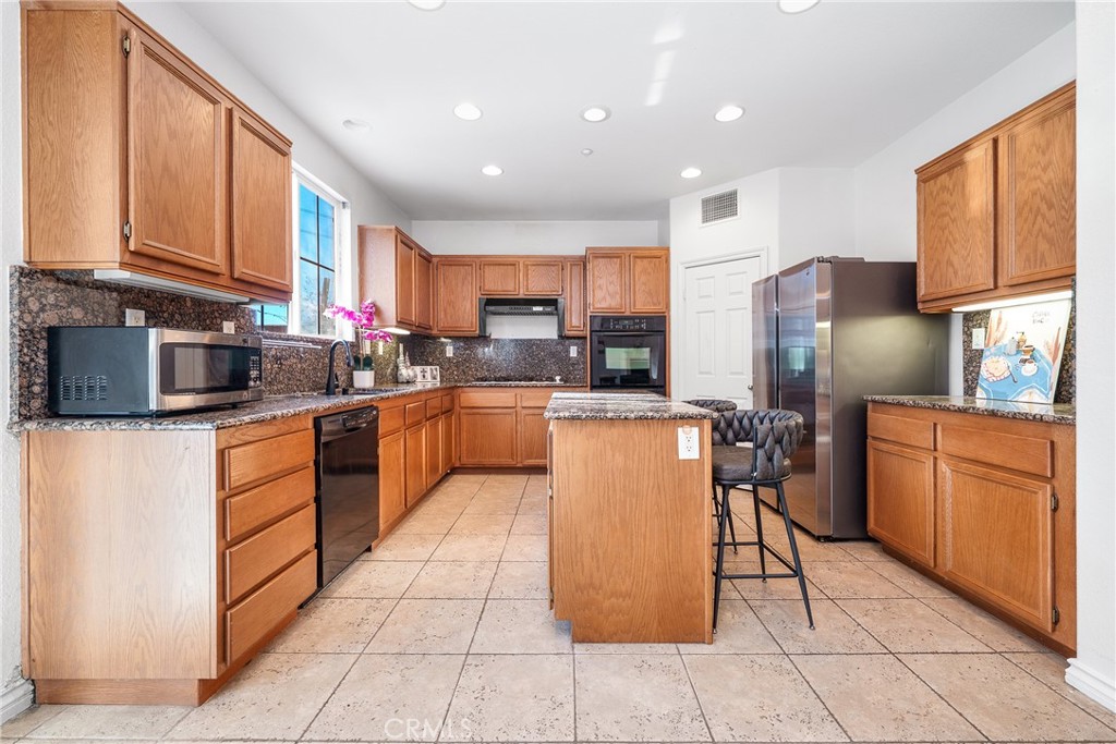 Residential for sale at 15187 Hawk Street, Fontana CA featuring 5 beds and 3 baths