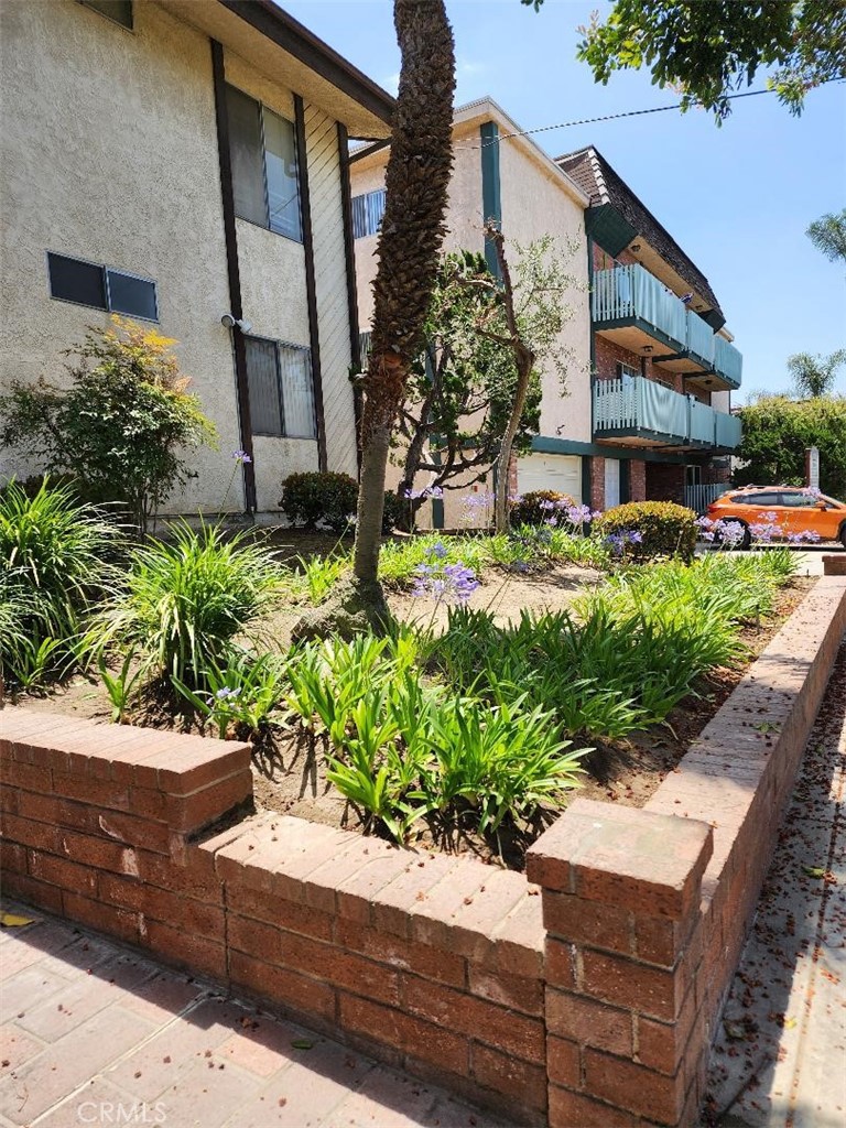 Residential for sale at 15116 S RAYMOND Avenue 104, Gardena CA featuring 2 beds and 2 baths