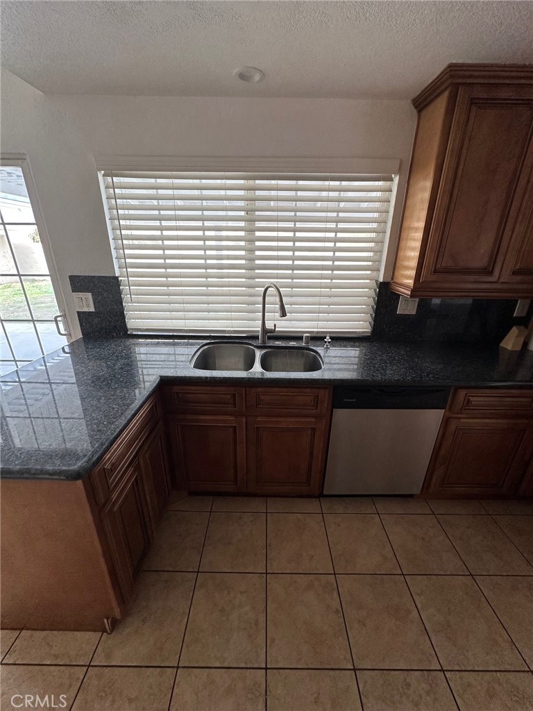 Residential Lease for rent at 15858 Montgomery, Fontana CA featuring 4 beds and 3 baths