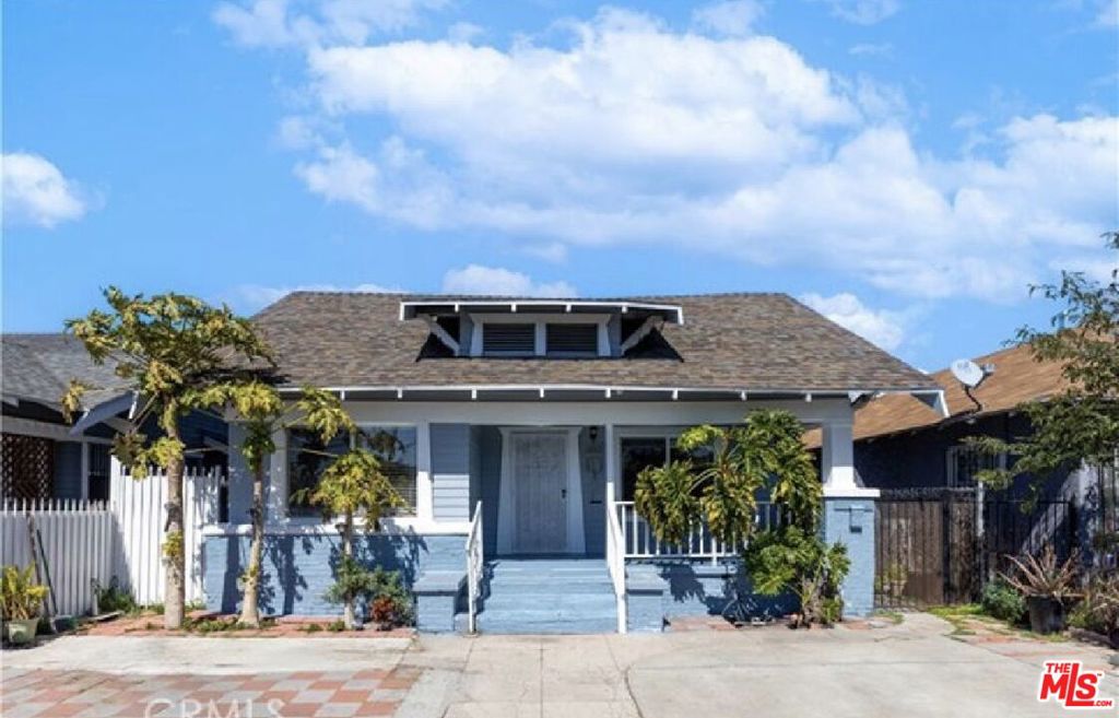 Residential Income for sale at 1147 W 53rd Street, Los Angeles CA featuring 5 beds and 2 baths