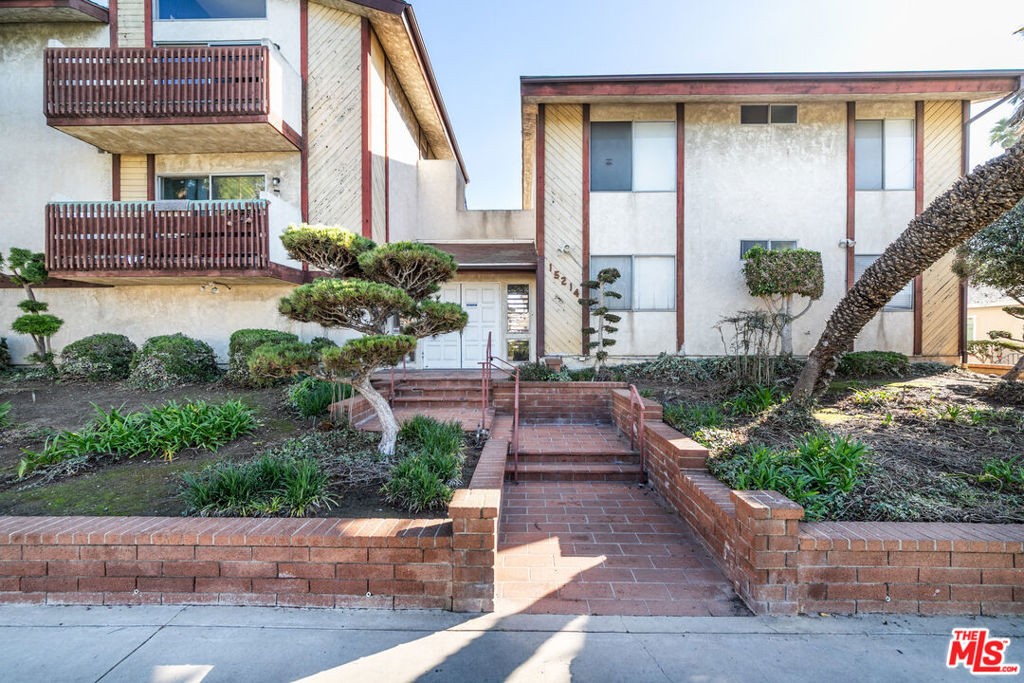 Residential for sale at 15214 S Raymond Avenue 111, Gardena CA featuring 2 beds and 2 baths