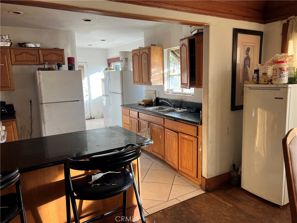 Residential for sale at 4284 La Salle, Los Angeles CA featuring 4 beds and 2 baths
