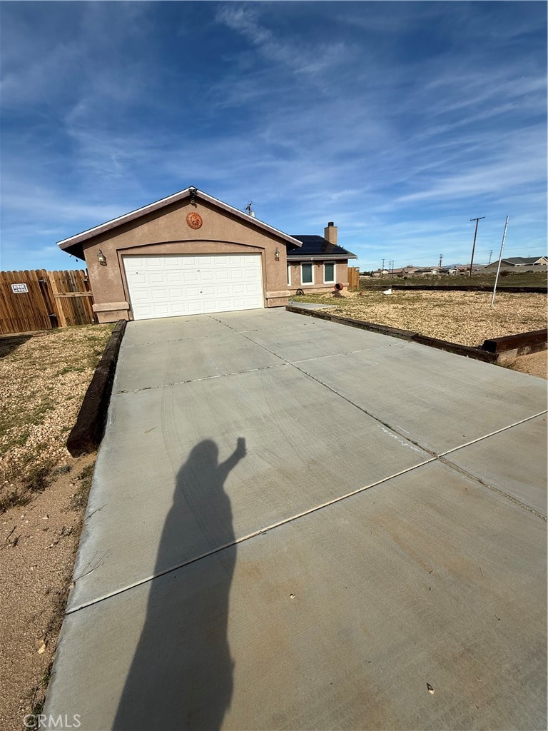 Residential for sale at 8825 Xavier Avenue, California City CA featuring 4 beds and 2 baths